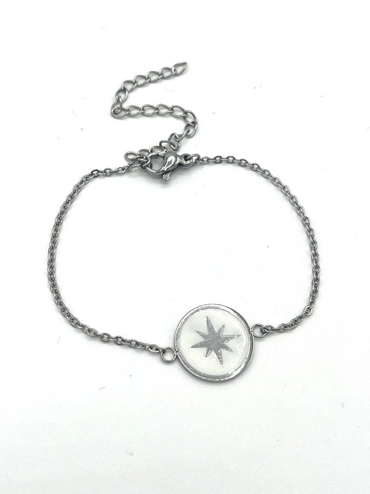 Zilverkleurige armband met ster bedel