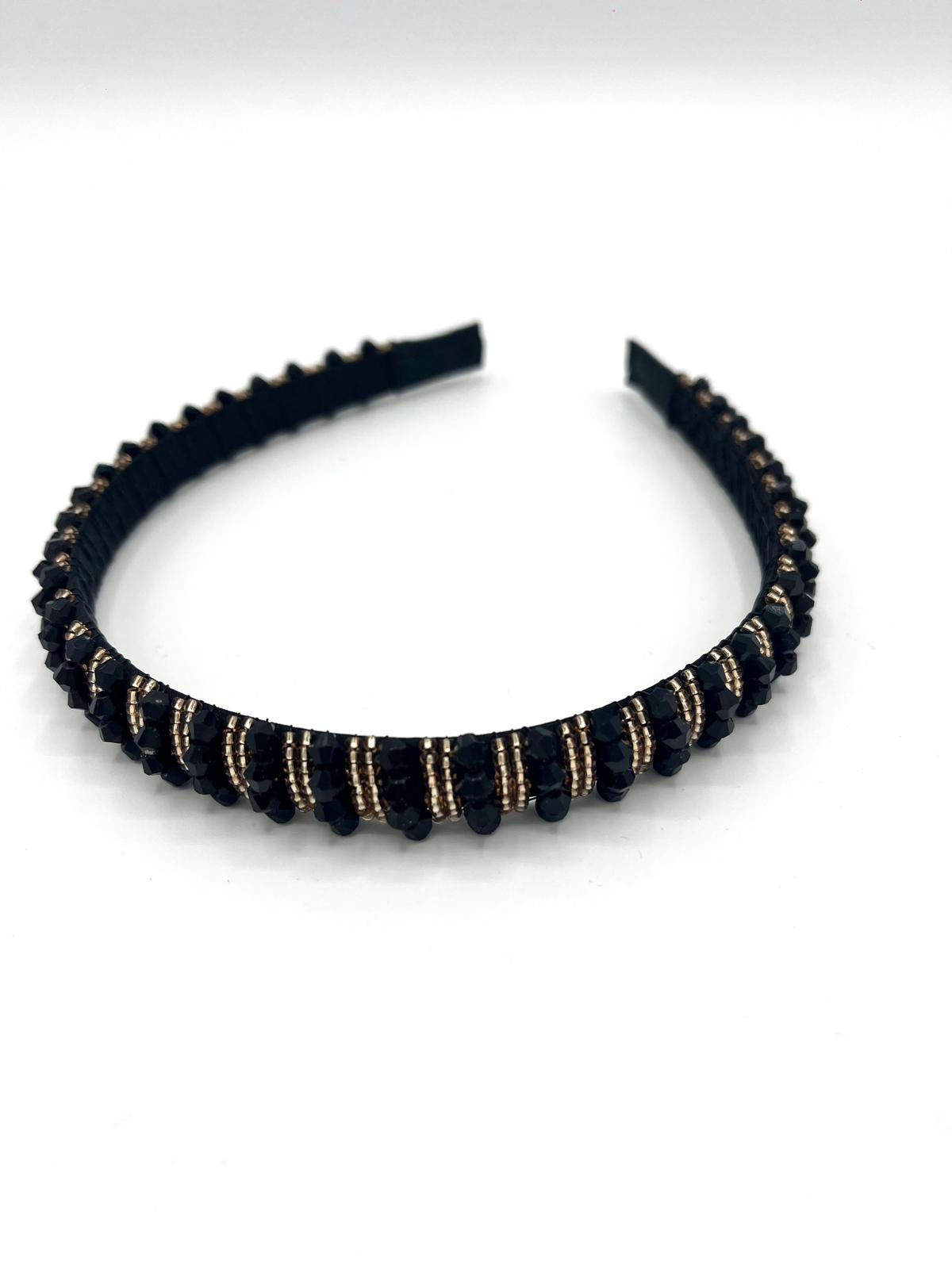 Smalle zwarte haarband met gouden sprankelende kralen