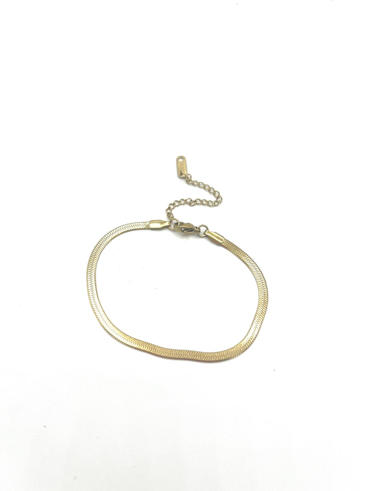 Goudkleurige armband met slangenpatroon