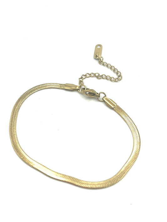 Goudkleurige armband met slangenpatroon