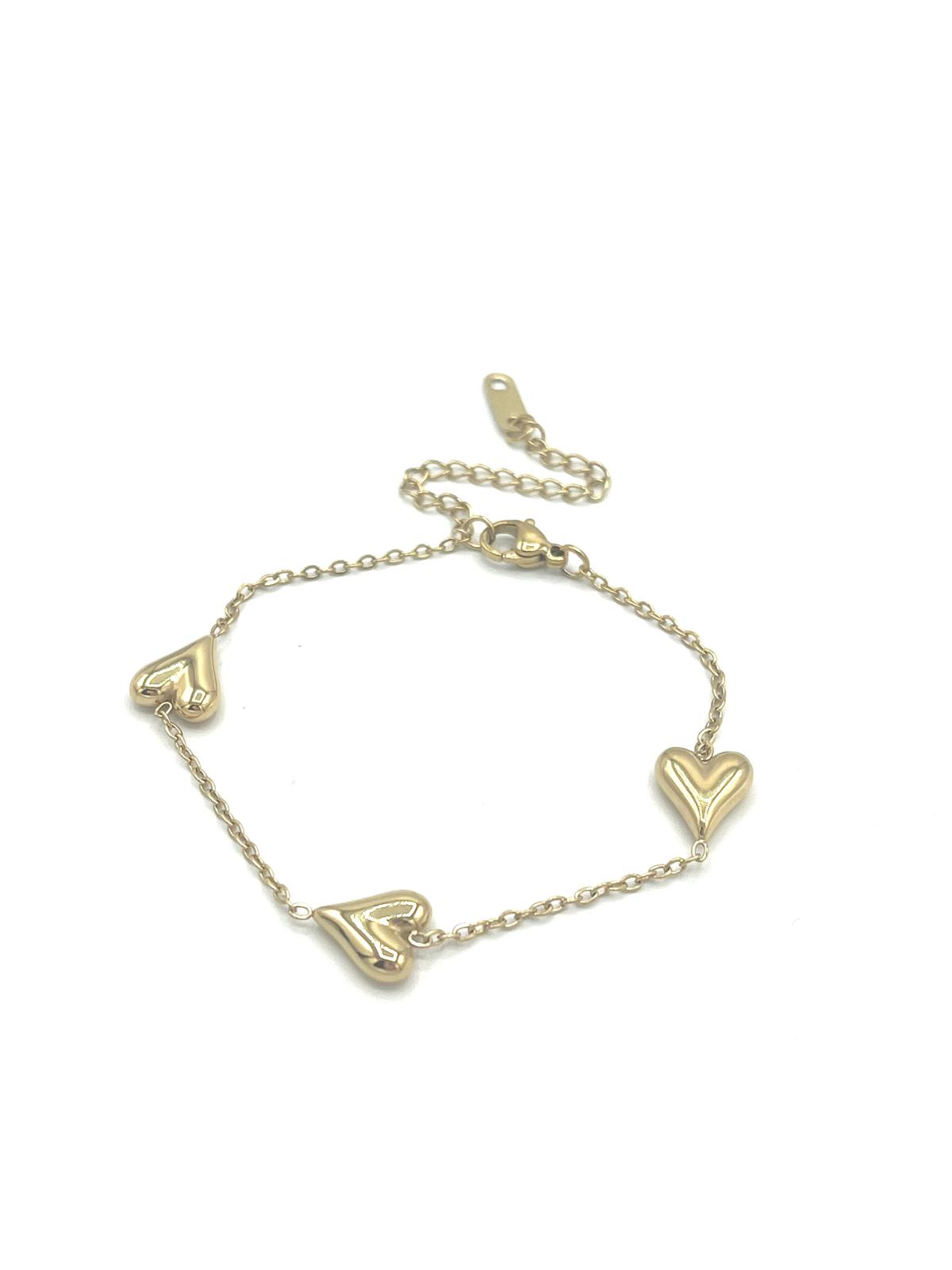 Goudkleurige armband met drie harten