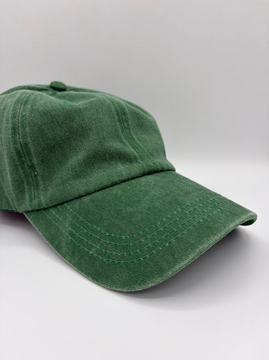 Groene verwassen pet