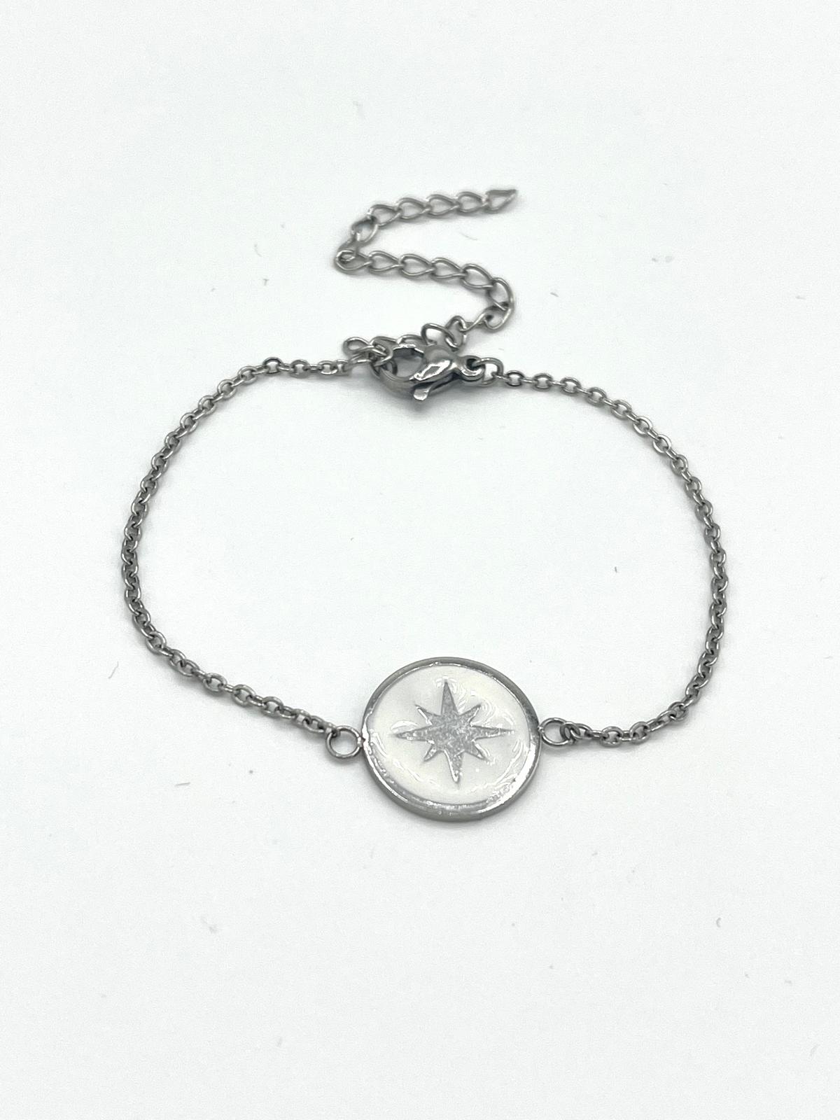 Zilverkleurige armband met ster bedel