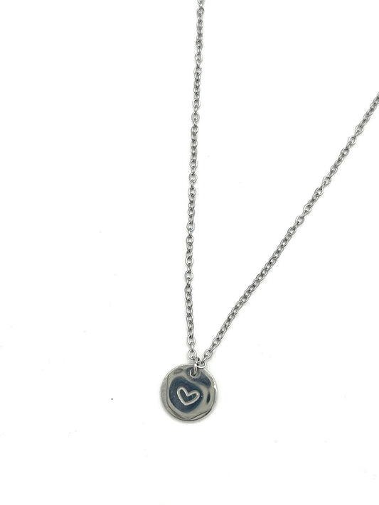 Zilverkleurige ketting met hart bedel