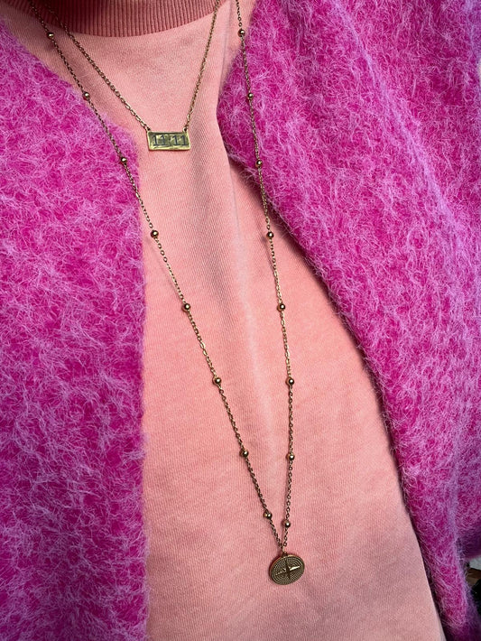 Lange ketting met sterbedel en balletjes