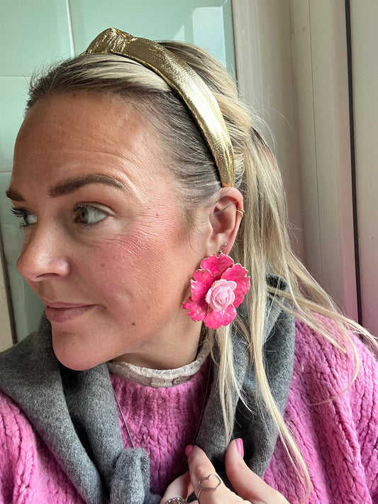 Goudkleurige haarband met knoop