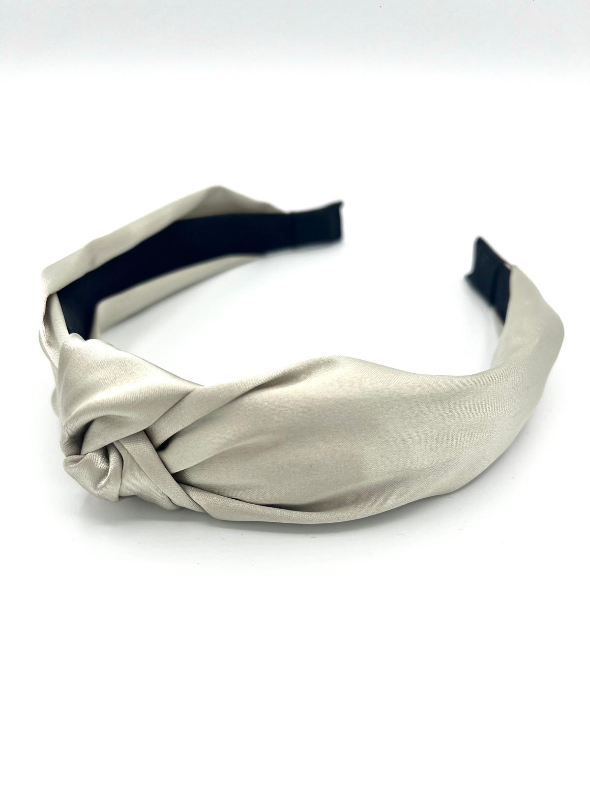 Champagnekleurige haarband met knoop