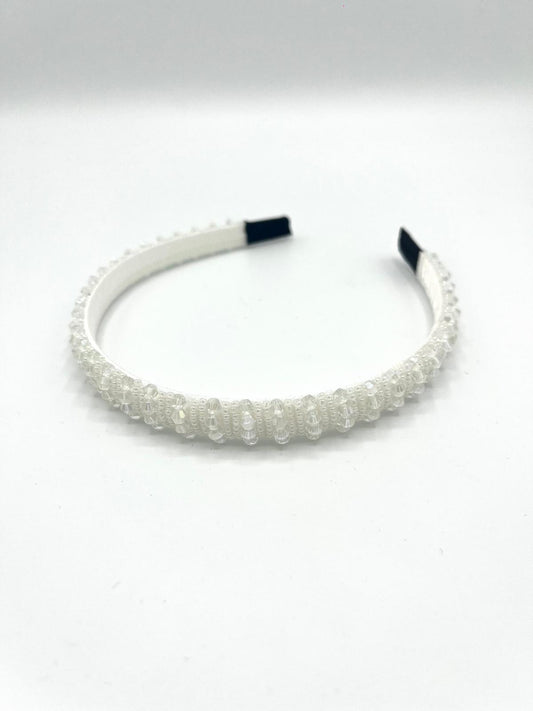 Smalle witte haarband met sprankelende kralen