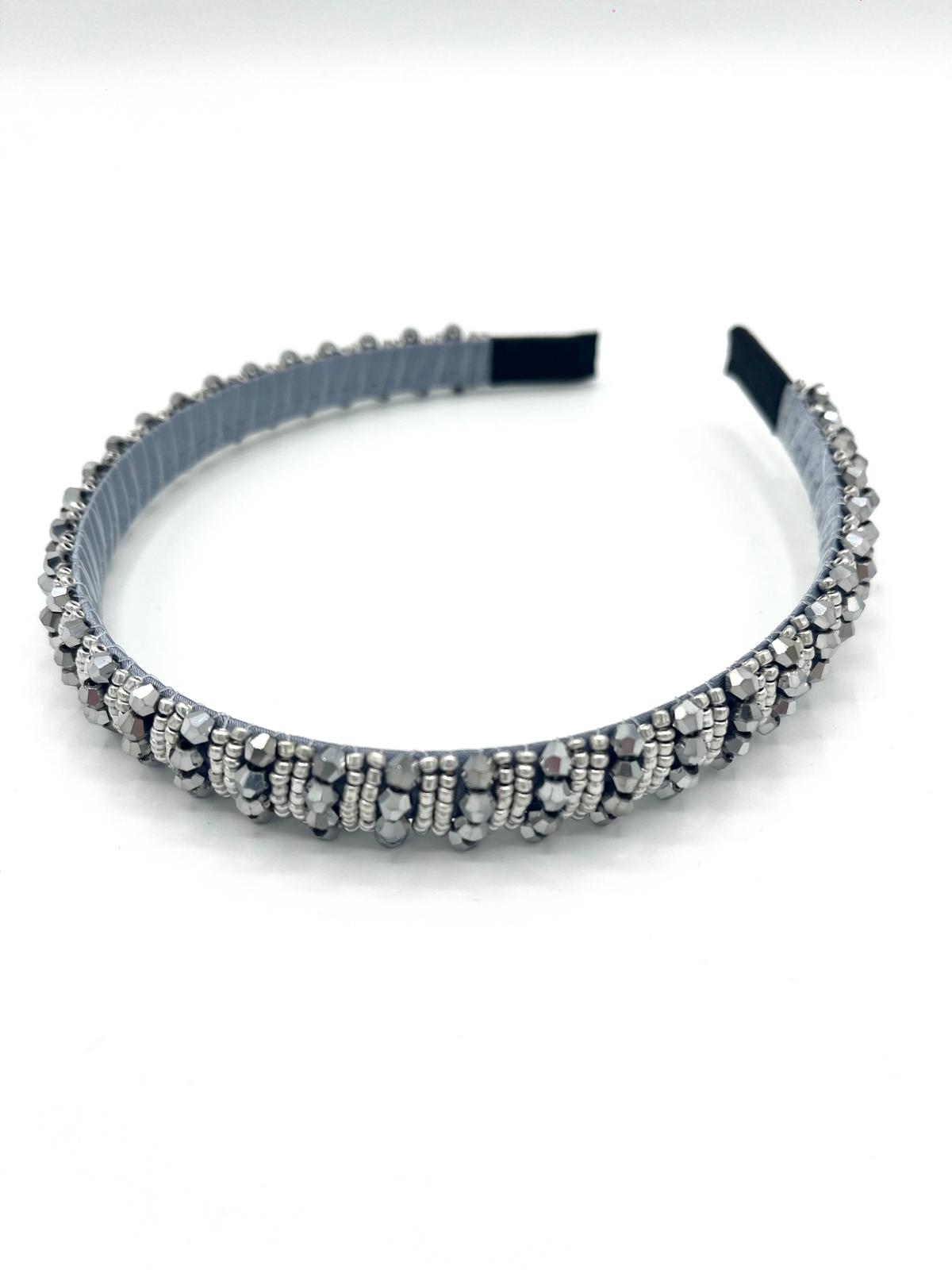 Smalle zilveren haarband met sprankelende kralen