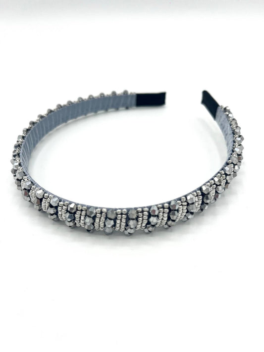 Smalle zilveren haarband met sprankelende kralen