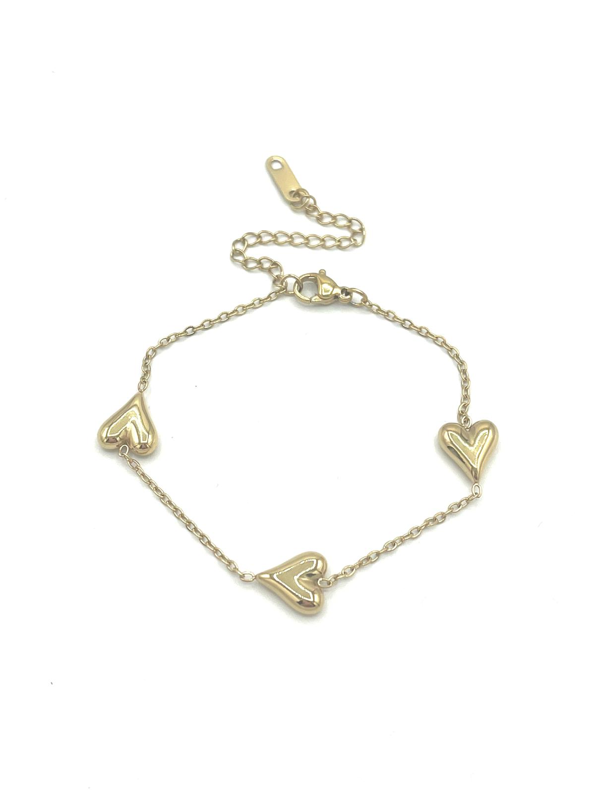 Goudkleurige armband met drie harten