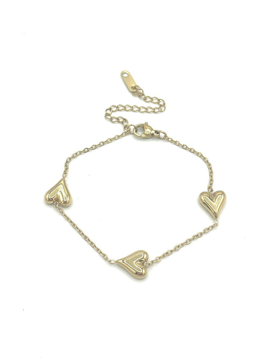 Goudkleurige armband met drie harten